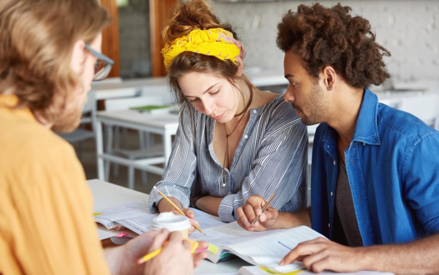Business professionals analyzing budget performance metrics and financial reports