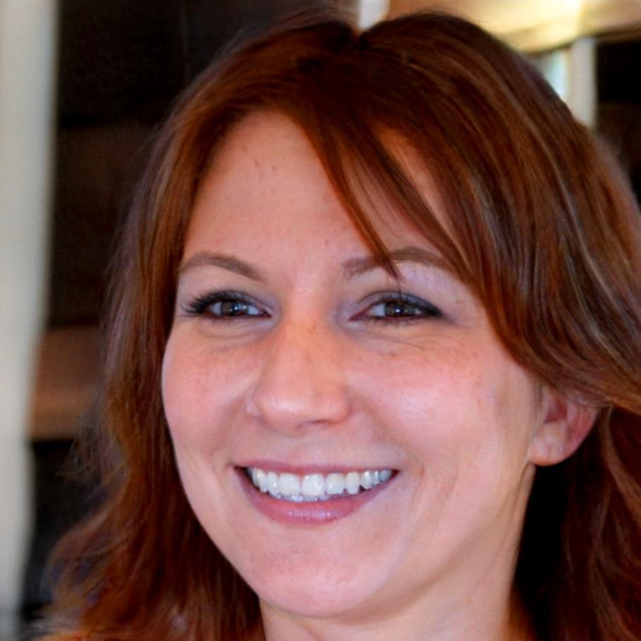 Professional headshot of Rhiannon Blackwood, Budget Performance Specialist